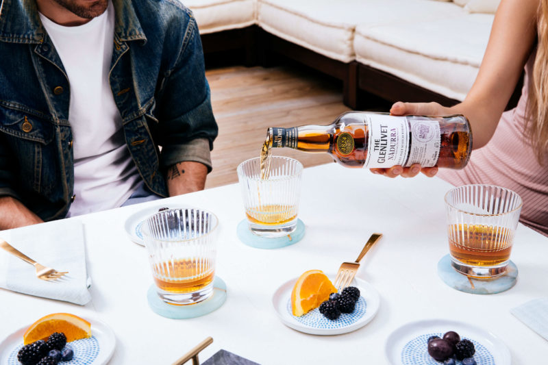 The Glenlivet being poured at a casual get together